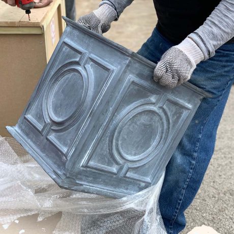 lead planter being unpacked by worker